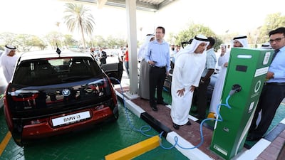 Above, the charging station at Dewa's Dubai headquarters. Pawan Singh / The National