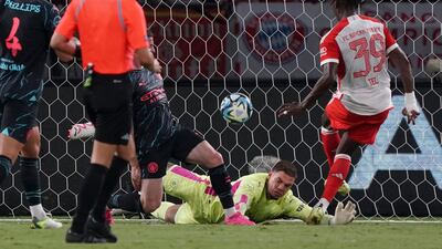 Bayern Munich forward Mathys Tel scores their goal. AFP