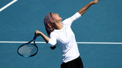 Meshkatolzahra Safi serves to Anja Nayar during their first round match. Getty Images