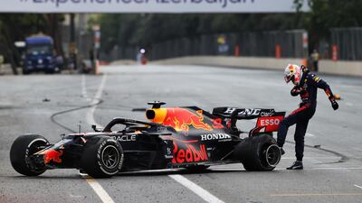 Red Bull driver Max Verstappen kicks his car after crashing late in the race. Getty