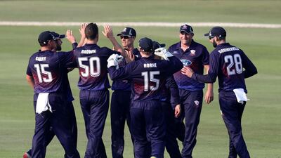 Ace's Jamie Brown takes the wicket of Defenders' Cameron Delport in the game between Auckland Aces and the Boost Defenders in the Abu Dhabi T20 competition.