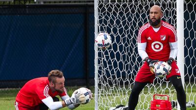 MLS goalkeepers Stefan Frei of Switzerland, left, and Tim Howard of the United States go through drills during practice for their All-Star Game against Real Madrid in Chicago. Tannen Maury / EPA