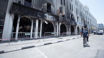 Though the fire sent smoke over Dubai International Airport, a spokesperson said that operations were not affected by the blaze. Ruel Pableo for The National