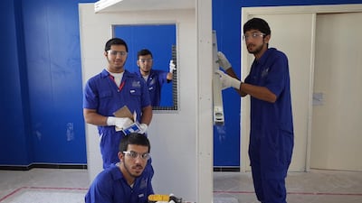 Khalifa Al Hammadi, Hamed Al Mazimi, Rashid Mohammed and Ahmed Al Nuami will have just 14 hours to build a partition with a window, ceiling and exterior wall from scratch. Delores Johnson / The National