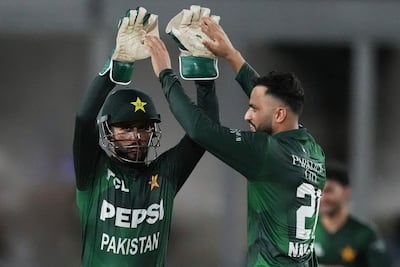 Pakistan's Mohammad Nawaz, right, picked up three wickets in one over. AP