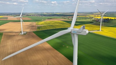 Engie Green power-generating windmill turbines in rapeseed and wheat fields in Saint-Hilaire-lez-Cambrai, France. Reuters