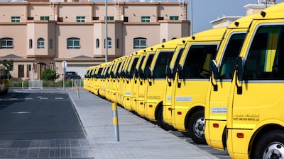 School buses are parked at the International School of Choueifat Abu Dhabi, where remote learning has been in place. Victor Besa / The National
