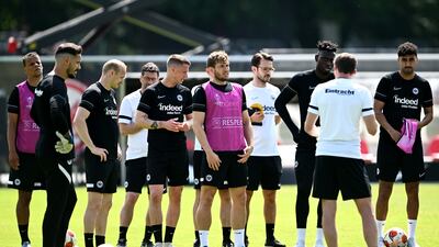 Eintracht Frankfurt players listen to coach Oliver Glasner. Getty