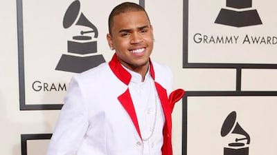 Chris Brown will perform at the Grammys. Danny Moloshok / Reuters