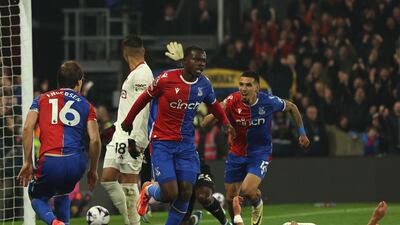 Tyrick Mitchell starts to celebrate after scoring to give Crystal Palace a 3-0 lead. AFP