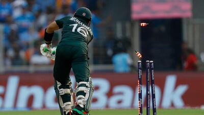 Pakistan's Mohammad Rizwan is bowled out by India's Jasprit Bumrah. Reuters