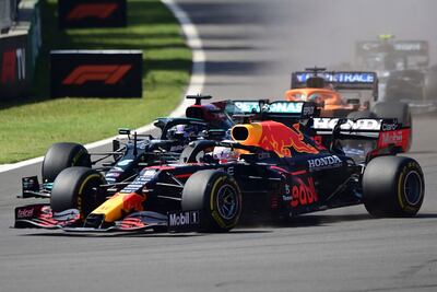 Red Bull's Max Verstappen races ahead of Mercedes' Lewis Hamilton during the Formula One Mexico Grand Prix on Sunday. AFP