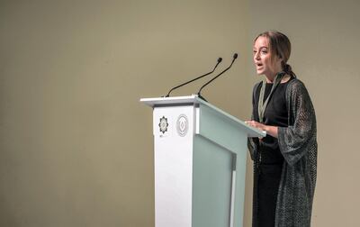 Elif Narbay speaks to the audience after becoming the first recipient of the Haitham Zamzam Al Hammadi Medal of International Friendship. Photo by American Community School of Abu Dhabi, May 2018