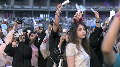 Fans wait for the performers to take the stage at SM Town Live World Tour VI in Dubai. Reem Mohammed / The National