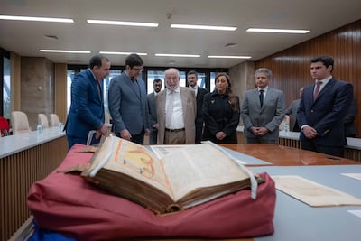 Sheikh Dr Sultan bin Muhammad Al Qasimi is briefed on rare manuscripts at the Portuguese National Archives, accompanied by officials from Sharjah and Portugal. Photo: Sharjah Media Office