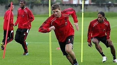 Steven Gerrard, right, the Liverpool captain, trains with the rest of the squad ahead of last night's match against Robotnicki in the second leg of their third qualifying round for the Europa League.