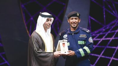 Sheikh Hazza bin Zayed, National Security Adviser and Deputy Chairman of the Executive Council of Abu Dhabi Emirate honoured the winners of the Abu Dhabi Award for Excellence in Government. Here, Sheikh Hazza honours Tareq Al Kindi. Courtesy Al Ittihad
