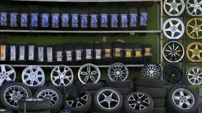 Tyres on display at an autoparts shop in Beijing, China. The sale of counterfeit parts is a major problem for the car industry in the UAE.