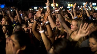Fans wait for Rihanna to perform in concert at du Arena, Yas Island during the Abu Dhabi leg of the singer’s Diamonds World Tour on October 19, 2013. Christopher Pike / The National