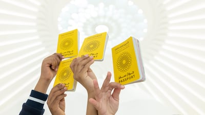 A school group inside the UAE pavilion holding Expo passports. Photo: Expo 2020 Dubai
