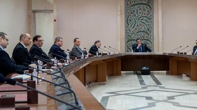Syrian President Bashar Al Assad meets with the government committee that oversees measures to curb the spread of the coronavirus disease in Damascus, Syria. REUTERS