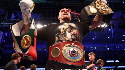 Oleksandr Usyk celebrates after beating Anthony Joshua at Tottenham Hotspur Stadium in London on Saturday, September 25. Getty