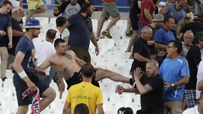 Clashes break out in the stands after the Euro 2016 Group B soccer match between England and Russia, at the Velodrome stadium in Marseille, France. Thanassis Stavrakis / AP