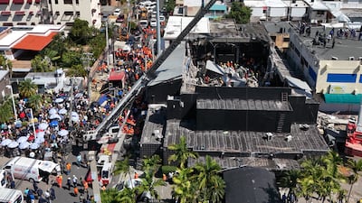 The Jet Set nightclub in Santo Domingo, with rescuers working among the debris of the collapsed roof. EPA