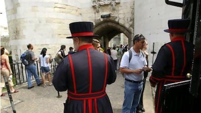 'Beefeaters' stand guard at the Tower of London yesterday as its former governor says he was fired after challenging illegal activities at the 900-year-old fortress.