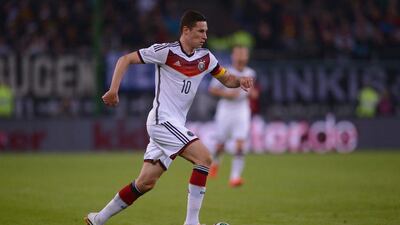 Julian Draxler captained Germany's youngest-ever international side against Poland in a friendly on Tuesday. Lars Baron / Bongarts / Getty Images / May 13, 2014