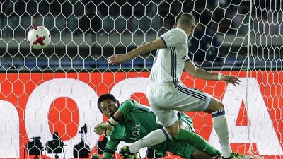 Real Madrid’s Karim Benzema scores the first goal. Kiyoshi Ota / EPA