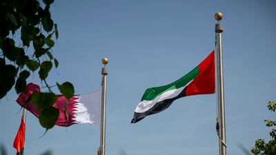 Flags of the UAE and Qatar fly high at Hamad International Airport