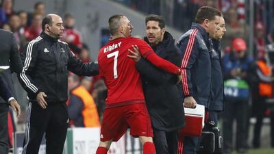 Atletico Madrid coach Diego Simeone clashes with Bayern Munich’s Franck Ribery. Kai Pfaffenbach / Reuters
