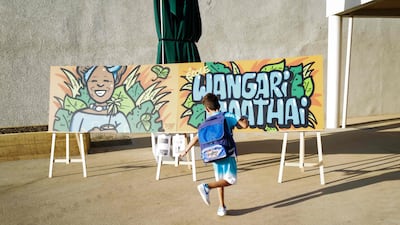 A child arrives at the new Wangari Maathai elementary school in Lyon. AFP