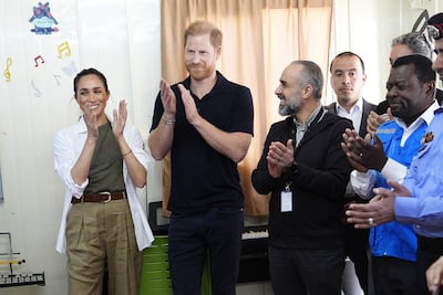 The Duke and Duchess of Sussex visiting a youth centre in Jordan. PA