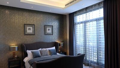 A bedroom on the first floor in a six-bedroom Modern Arabic villa. A further 511 properties of the 631 villa phase 2 are sold with delivery scheduled for Q3 2017. Satish Kumar / The National