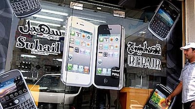 A shop window in Dubai still advertises the BlackBerry a week before a ban would take effect.