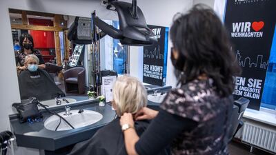 Hair salons will reopen in Germany from next month. Getty Images