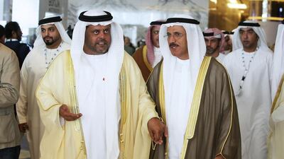Arabtec chairman Mohamed Al Rumaithi, left, with the Minister of the Economy Sultan Al Mansouri during the 17th Arab Businessmen and Investors Conference in Abu Dhabi on Monday. Pawan Singh / The National
