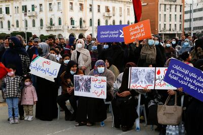 People hold a protest in Tripoli against Fathi Bashagha, who was appointed prime minister by the country's eastern parliament. AP