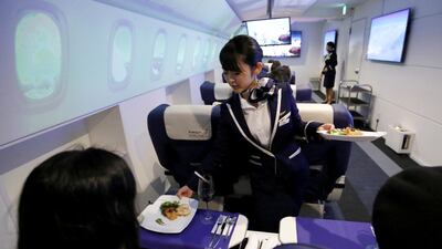 Guests experience a two hour flight on Japan's "First Airlines" without ever taking off. All photos by Toru Hanai / Reuters