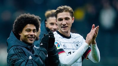 Germany's Serge Gnabry and Niklas Stark after the win against Northern Ireland. AFP