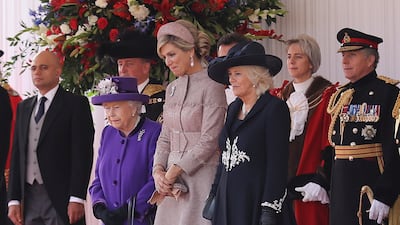King Willem-Alexander of the Netherlands, Britain's Queen Elizabeth, Queen Maxima of the Netherlands, Prince Charles, and Camilla, Duchess of Cornwall stand during a ceremonial welcome at the start of a state visit at Horse Guards Parade in London. Christopher Furlong / Reuters