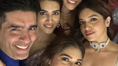 Manish Malhotra with Kriti Sanon, Samiksha Pednekar, Bhumi Pednekar and Anushka Ranjan. Photo: Instagram / manishmalhotra05
