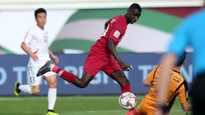 Almoez Ali scores to give Qatar a 4-0 lead over North Korea. EPA