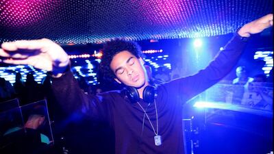 DJ Trey Smith at work at The VIP Room in Dubai. The VIP Room