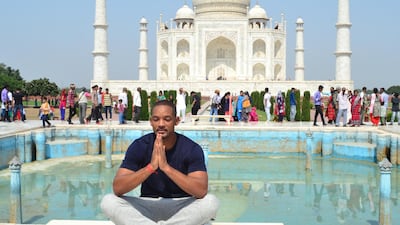 Hollywood star Will Smith gestures as he visits the Taj Mahal on October 10, 2018. AFP