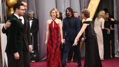 Recording artist Dave Grohl, right, and Jordyn Blum attend the 88th Annual Academy Awards at Hollywood & Highland Center. Christopher Polk / Getty Images / AFP