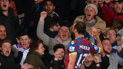 Crystal Palace's Glenn Murray celebrates scoring their opening goal against Manchester City in the Premier League on Monday. Glyn Kirk / AFP