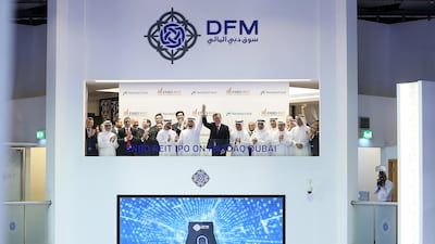 The bell ringing of ENBD Reit’s listing on Nasdaq Dubai held at Dubai Financial Market in Dubai. Pawan Singh / The National